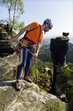 Climbers in Rathen in Saxon Switzerland