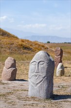 Balbals, historical gravestones in the shape of human faces, near Tokmok, Chuy, Kyrgyzstan, Asia