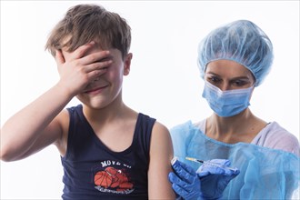 A little boy receives a vaccination, symbol motif