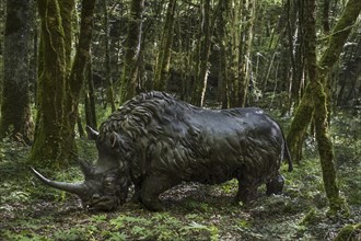 Diorama showing woolly rhinoceros (Coelodonta antiquitatis) at Prehisto Parc, theme park about