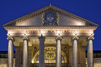 Portico with glass window, illuminated spa hotel and Casino in the evening, Wiesbaden, Hesse,