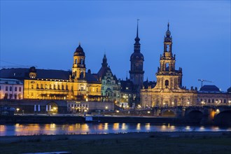 From left: Ständehaus, Georgentor, Hausmannsturm and Hofkirche at dusk on the Elbe River