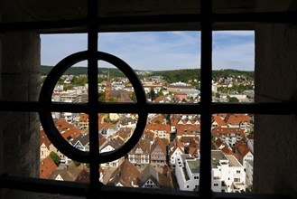 View of the town of Heidenheim through iron bars, Hellenstein Castle, buildings, houses, church,