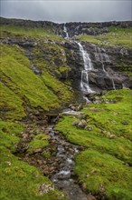 Waterfall in Estuyroy, Faroe islands, Denmark, Europe