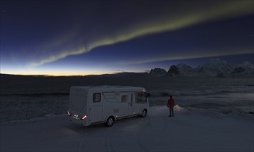 Motorhome in winter on pitch under the Northern Lights (Aurora borealis), Aurora Borealis,