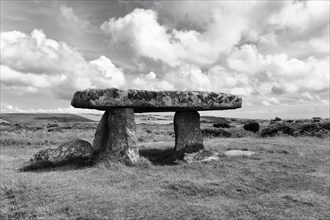 Portal tomb Lanyon Quoit, Neolithic dolmen in a meadow, monochrome, Penzance, Cornwall, England,