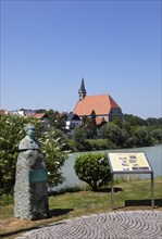 Monument by Karl Billerhart in Oberndorf near Salzburg with view to Laufen an der Salzach,