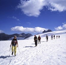 DEU, Germany: The historical slides from the times 80-90s, Alps. Mountaineer crossing a glacier.