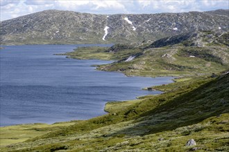 Fjell, barren mountain landscape with lake, Oystre Slidre, Jotunheimen National Park, Norway,