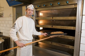 Master baker Dietze Jr. baking stollen