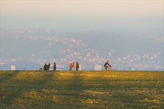 A family enjoys a little space during the lockdown while hiking on the mountain ranges around