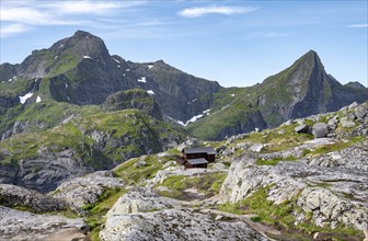 Mountain hut Munkebu Hütte, mountain landscape with rocky peaks and lakes, Hermannsdalstinden in