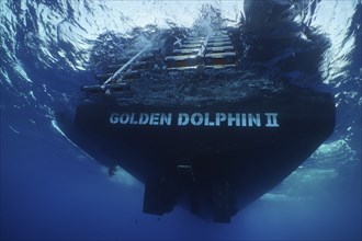 Safari boat, dive boat, Livaboard Golden Dolphin II, from below, ladder, exit. Dive site Umm Aruk,