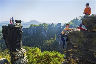 Climbers in Rathen in Saxon Switzerland