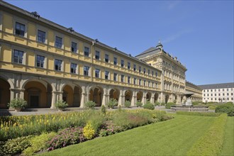 Inner courtyard with baroque princely building with arcade and gardens of the Juliasspital,