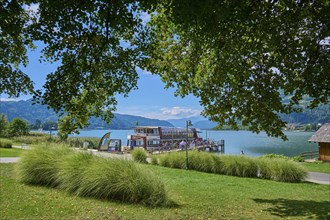 Lake shore, jetty, excursion boat, tourists, summer, Ossiach, Lake Ossiach, Carinthia, Austria,