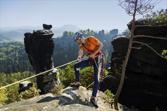 Climbers in Rathen in Saxon Switzerland