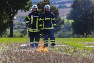 During controlled field fires, the firefighters were able to test various extinguishing methods,