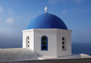 White-washed Church of Agios Nikolaos with Blue Dome, Ia, Oia, Santorini, Greece, Europe