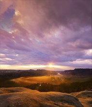 View of Rathen in the evening from the Gamrig in Saxon Switzerland