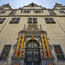 Main portal with colourful wood carving on Münden Town Hall, Weser Renaissance, Hann. Münden or