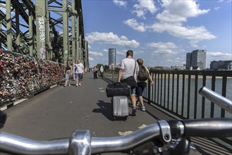 Cycling from a first-person perspective on a shared footpath and cycle path over the Hohenzollern