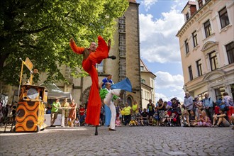 Actors, artists, clowns, fire artists and music bands transformed the city centre into a large