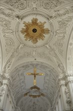 Interior view with ceiling fresco and golden crucifix from the Romanesque UNESCO Kiliansdom, St.