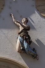 Statue of an angel on a house wall, Bamberg, Upper Franconia, Bavaria, Germany, Europe