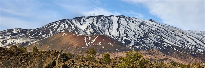 Panorama shot, reddish brown lava hill, snow, mountain, Etna, volcano, eastern Sicily, Sicily,