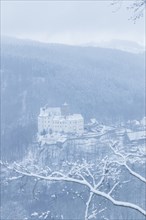 Scharfenstein Castle is a Spornburg on an elongated spur above the village of Scharfenstein