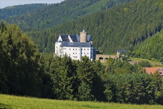 Scharfenstein Castle Scharfenstein Castle is located on an elongated mountain spur above the