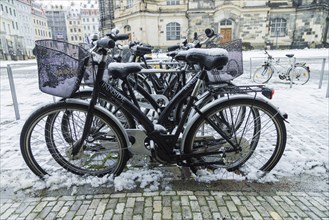 Snowed-in bicycles at Neumarkt