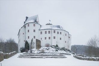 Scharfenstein Castle is a Spornburg on an elongated spur above the village of Scharfenstein