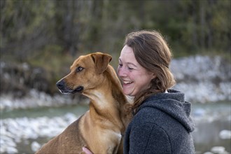 Young woman with her dog, intimate relationship, love of animals, Upper Bavaria, Bavaria, Germany,