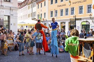 Actors, artists, clowns, fire artists and music bands transformed the city centre into a large