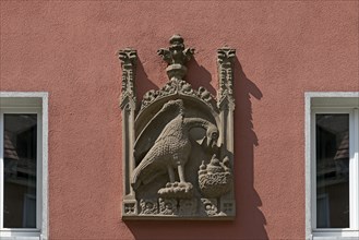 House sign, relief, eagle feeding its young in the nest, Bergstr. 13 ud 15, Nuremberg, Middle