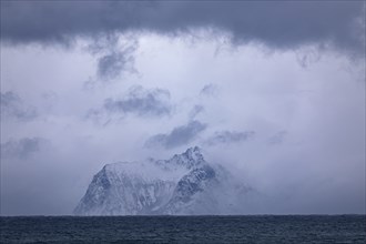 View from Andenes (Vesteralen) to the coast of Senja Island, Norway in bad weather