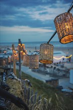 String of lights on the beach at blue hour, Zandvoort, Netherlands