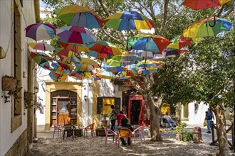 Cafe with colourful umbrellas in Kyrenia or Girne, Turkish Republic of Northern Cyprus