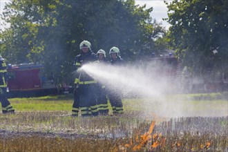 During controlled field fires, the firefighters were able to test various extinguishing methods,