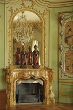 Chinese room with wall mirror, chandelier, fireplace, stucco and ornaments, interior view, castle,