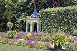 Pavilion and flower border, flower bed, in front of Old Castle, Eremitage, historical park,