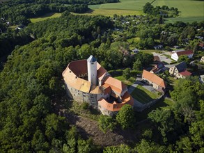 Schönfels Castle with the newly renovated keep (castle tower) . Schönfels Castle is a typical