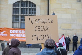 In Dresden, people gathered again on Neumarkt in front of the Church of Our Lady. On posters and