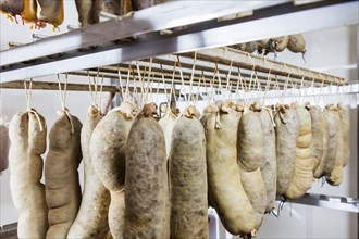 Liver sausage production in the Walde butcher's shop, here the sausages are smoked