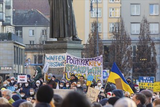 In Dresden, about 3, 000 people gathered on Neumarkt in front of the Church of Our Lady. On posters