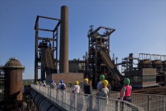 Group on the skywalk with a view of the blast furnaces, former Phoenix West industrial plant,