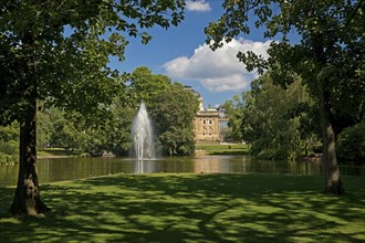 Fountain in the pond, Warmer Damm Landscape Park with Hessian State Theatre, Wiesbaden, Hesse,