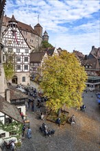 Square at the Tiergärtnertor with half-timbered houses, Pilatus House, at the Kaiserburg, in